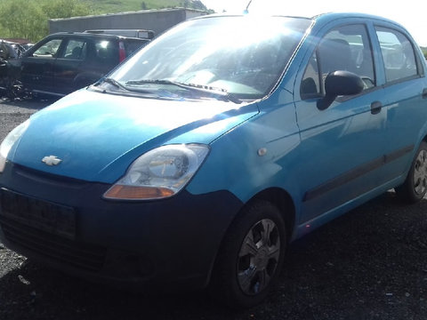 Oglinda completa stanga Chevrolet Spark 2009 796 Benzina Cod motor LBF(49CUL3) 52CP/38KW