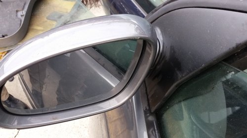 Oglinda stanga VW Golf 5, din 2005