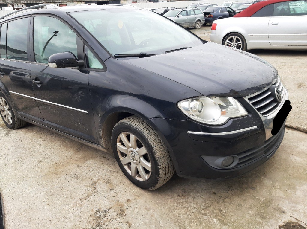 Planetara fata stanga Volkswagen Touran Sport an 2007 Motor 1.9 BXE Diesel Cutie viteze manuala