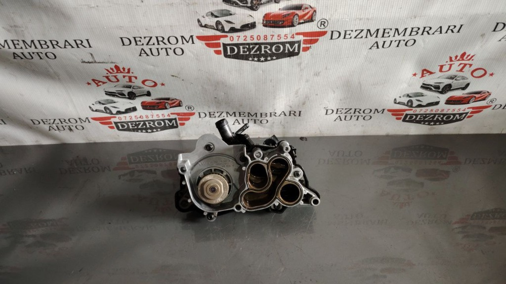 Pompa de apa cu carcasa 04E121121E Seat Leon IV Sportstourer (KL8) 1.4 e-HYBRID DGEA 204 cai