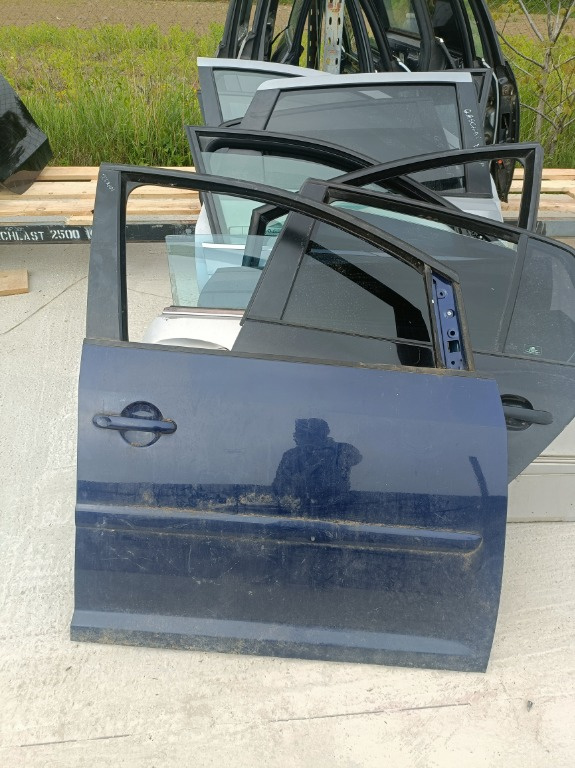 Portiera dreapta fata touran 1t1 2003-2010