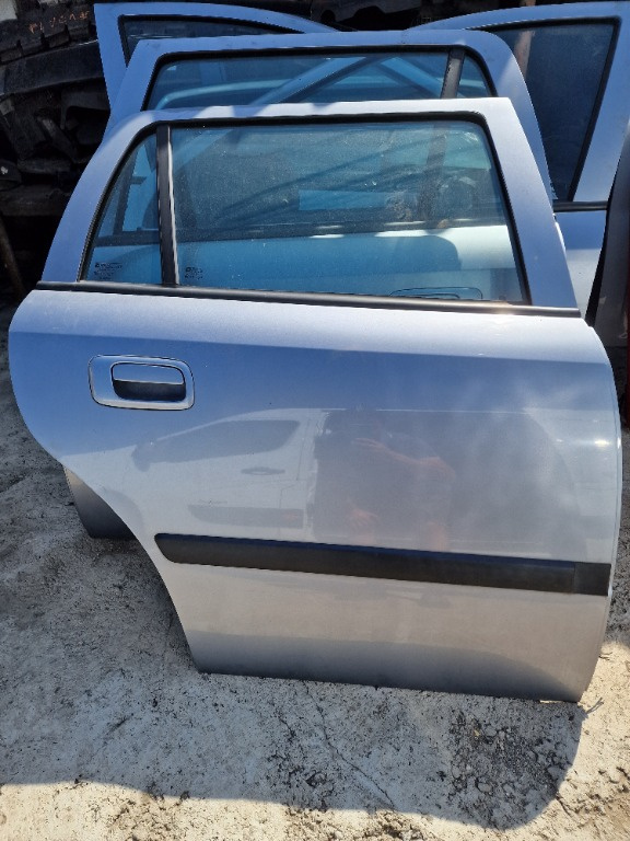 Portiera spate dreapta cu geam mare mic maner macara broasca Opel Astra G break combi