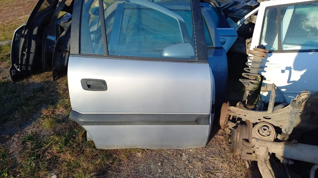 Portiera spate dreapta LOVITA Opel Zafira A cu geam mare geam mic maner macara broasca