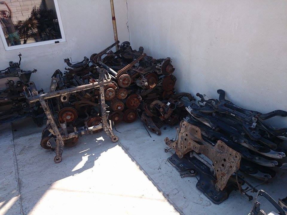 Punte spate completa cu tamburi in 5 prezoane Opel Astra G