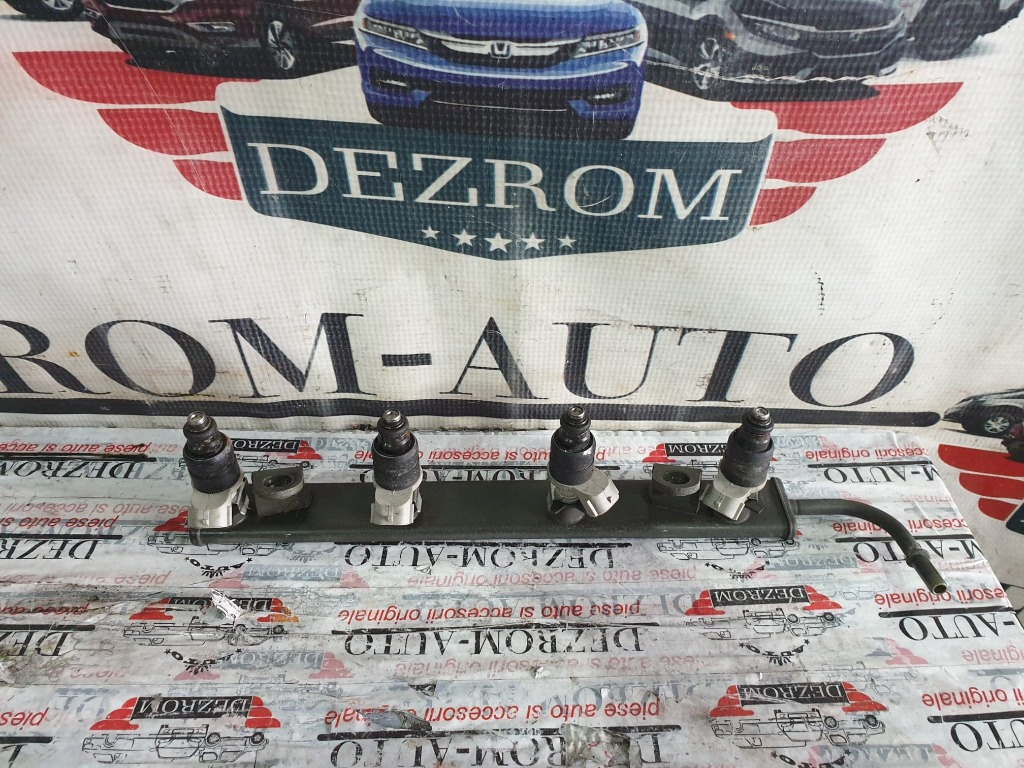 Rampa injectoare + injectoare Mitsubishi Colt 1.3i 95 cai cod piesa : MR988977
