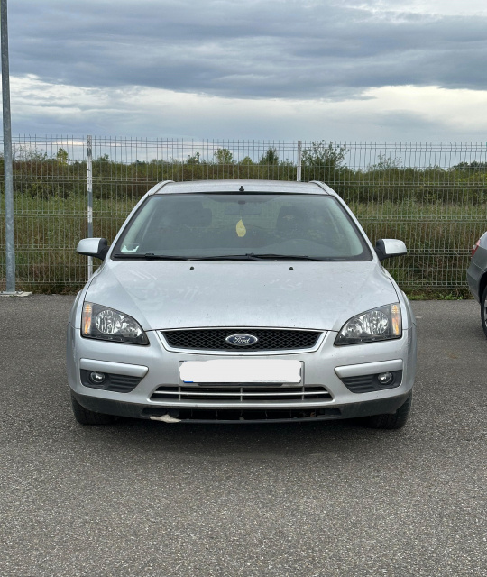 Sigla capota motor Ford Focus 2 [2004 - 2008] wagon 5-usi 1.6 TDCi MT (90 hp)