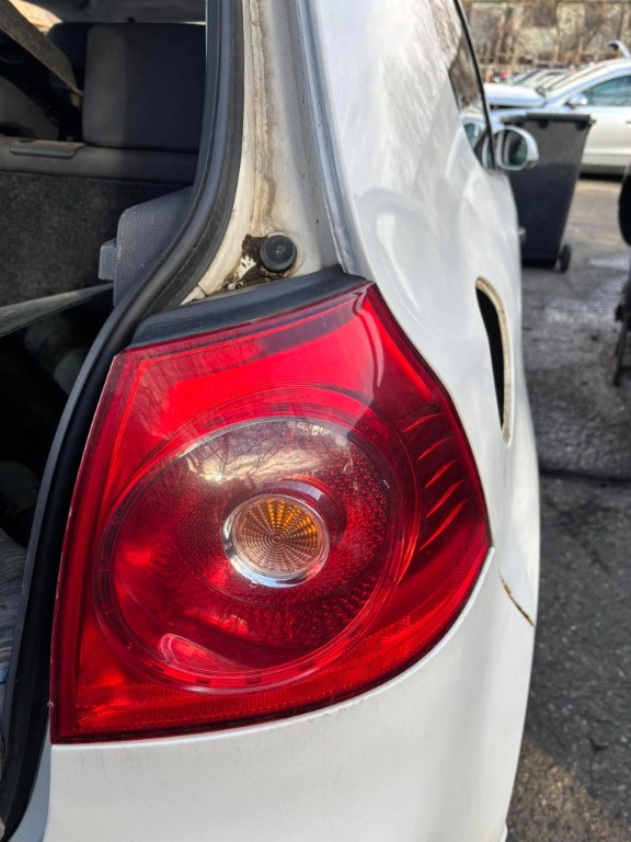 STOP DREAPTA PE ARIPA VW GOLF 5 IN 2 USI DIN 2007