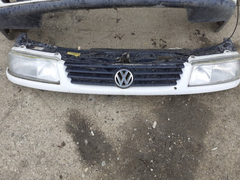 Trager / Panou frontal VW Passat B4 ( Faruri / Grila / Sigla ) Original