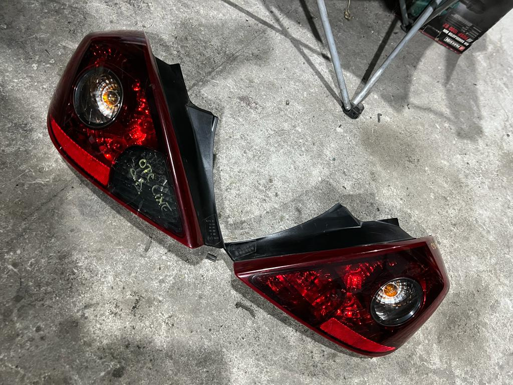 Tripla / Lampa spate Opel Corsa D OPC Line stanga