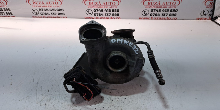 Turbosuflanta Cod: 7796311M12 BMW Seria 3 E90/E91/E92/E93 [2004 - 2010] Cabriolet 330d MT (231 hp)