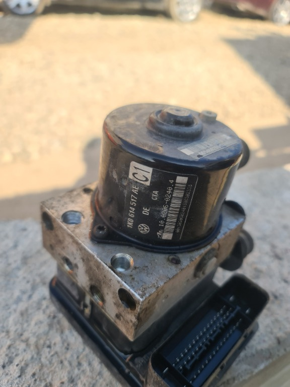 Unitate pompa ABS VW Golf, Touran cod 1K0 614 517 AE sau 1K0 907 379 AC