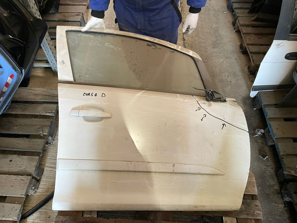 Usa dreapta fata Opel Corsa D cu defect