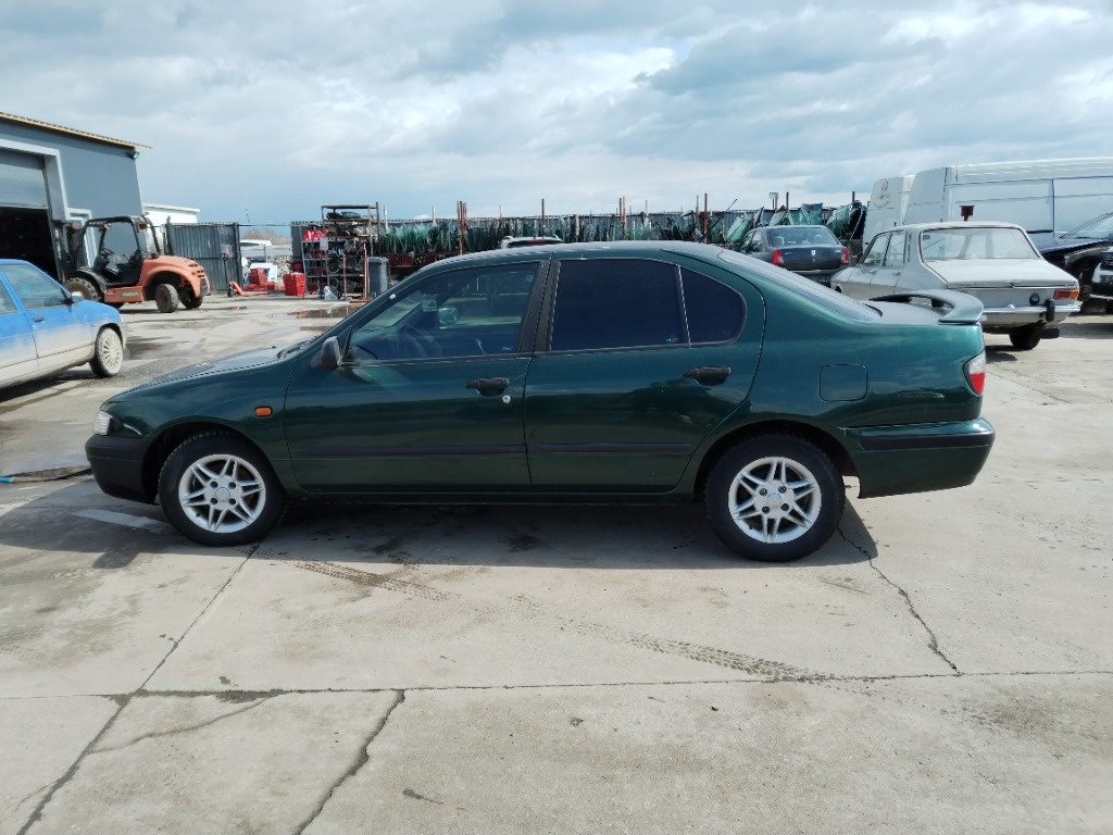 Usa stanga fata simpla Nissan Primera GX 1996 2.0 TD CD20 56KW/75CP