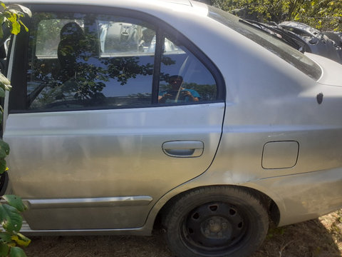 Usa stanga spate Hyundai Accent hatchback an 2004